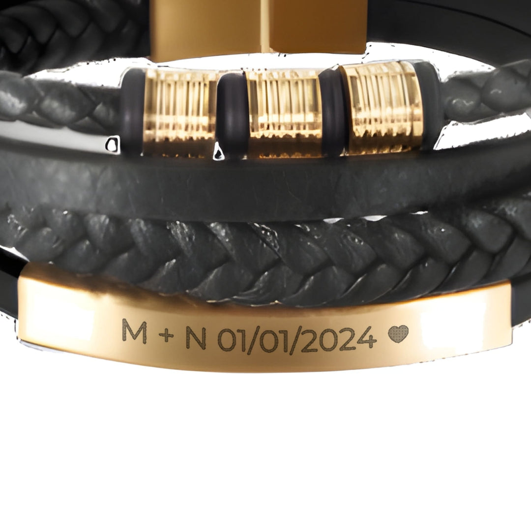 Black & Gold Leather Bracelet engraving example: M + N 01/01/2024 and a heart on the gold bar