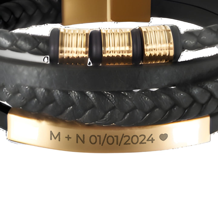 Black & Gold Leather Bracelet engraving example: M + N 01/01/2024 and a heart on the gold bar