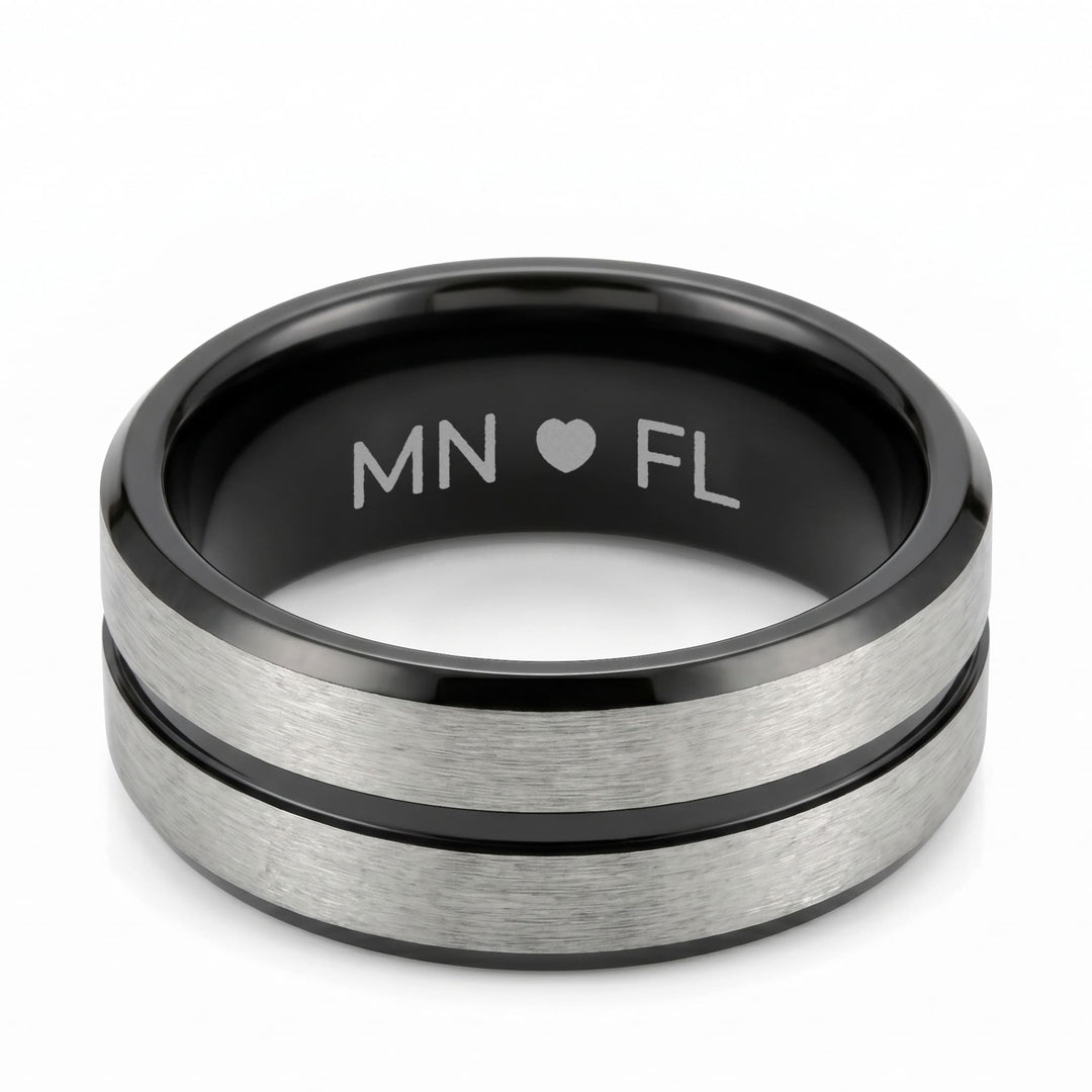 Black Onyx and Silver Band engraving example: MN, a heart and FL engraved inside the black band