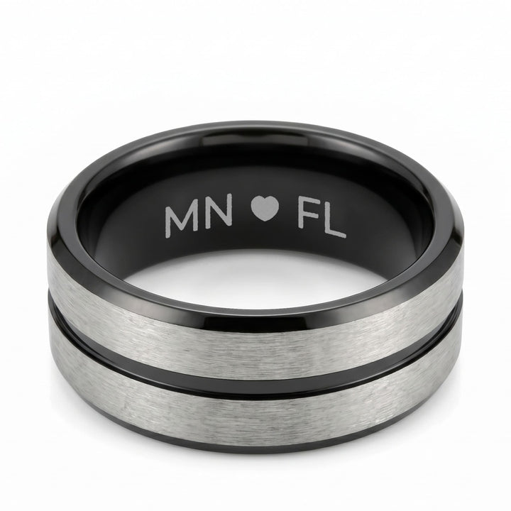 Black Onyx and Silver Band engraving example: MN, a heart and FL engraved inside the black band