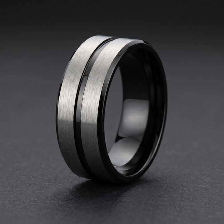 Black Onyx and Silver Band standing on a dark charcoal surface