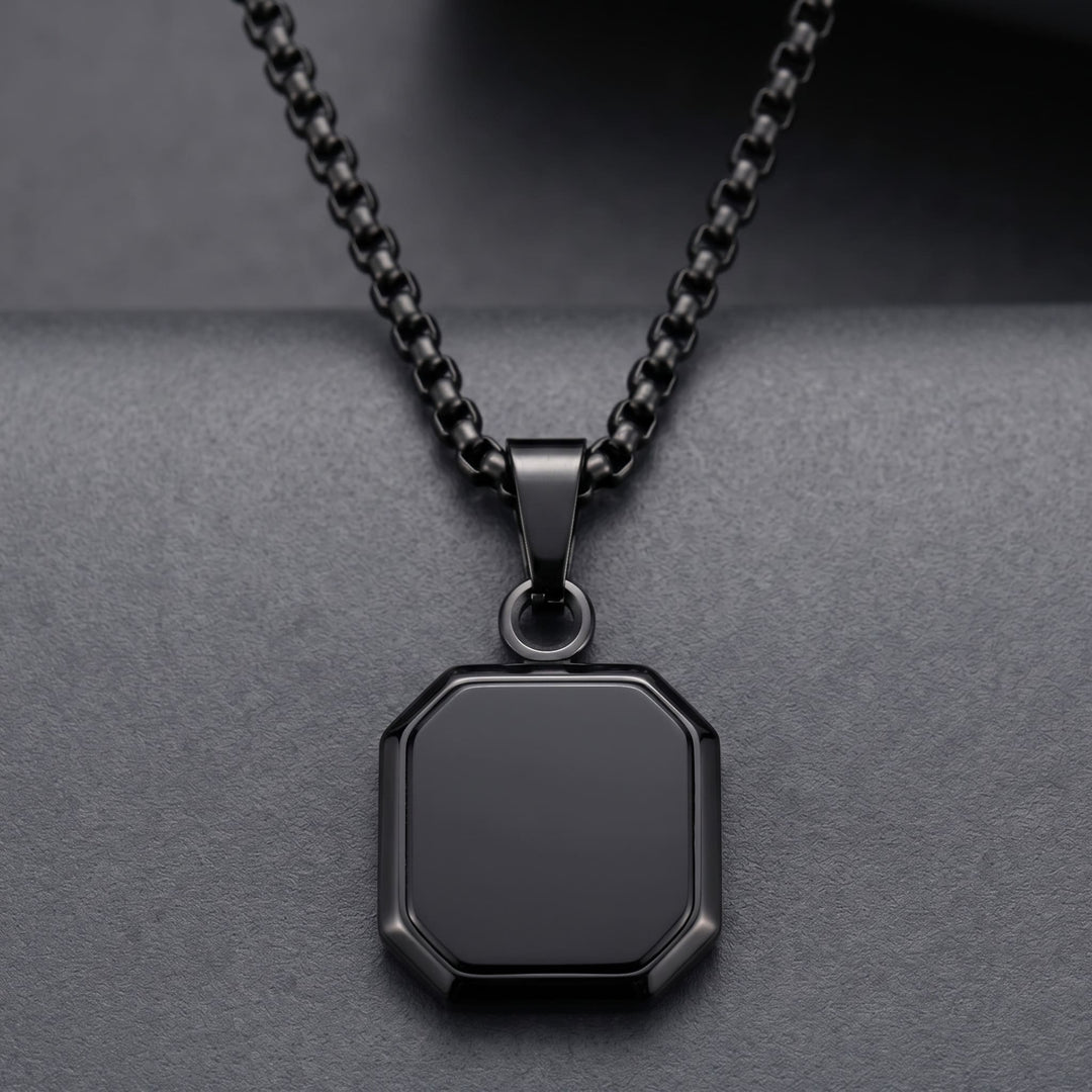 Onyx Square Necklace (Black) against a dark charcoal backdrop