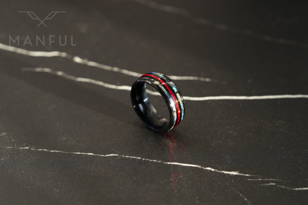 Blaze Crystal Ring, close-up standing upright on a dark marble surface