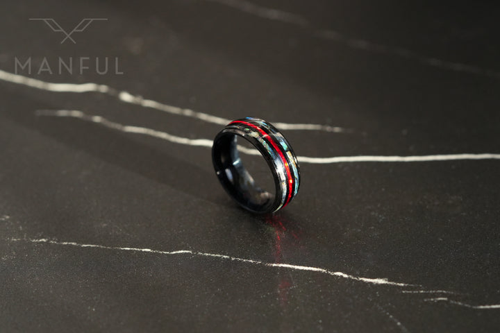 Blaze Crystal Ring, close-up standing upright on a dark marble surface