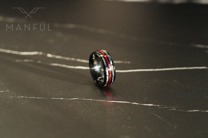 Blaze Crystal Ring, standing upright on a dark marble surface, pulled back to show more of the slab