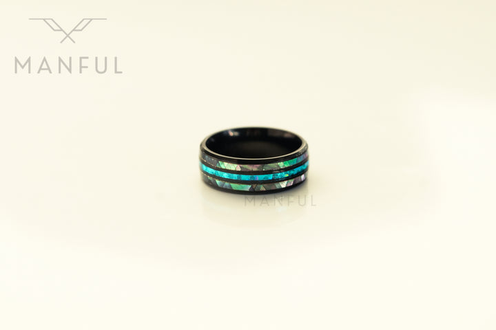 Blue Crystal Ring, front-facing on a plain cream background showing the shell-effect inlay