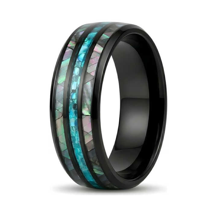 Blue Crystal Ring, close-up of the abalone-effect blue-green inlay on a black band, isolated on white