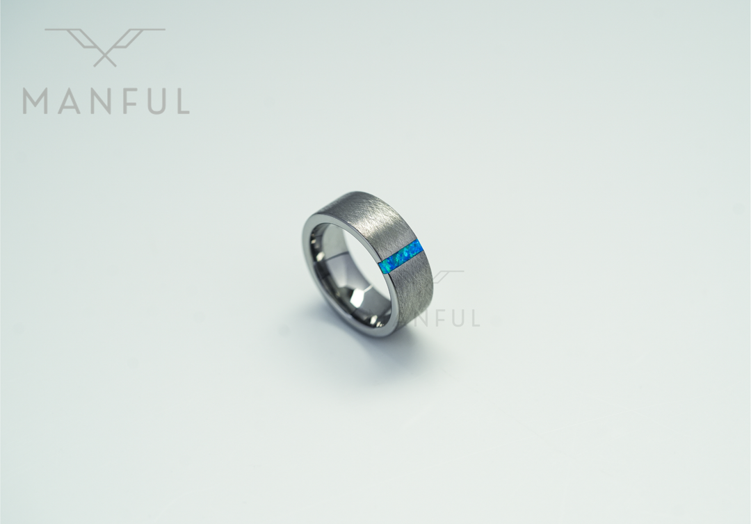 Azure Opal Line Tungsten Band, angled top-down view on a plain white background