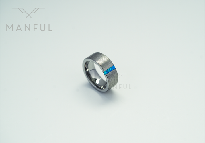 Azure Opal Line Tungsten Band, angled top-down view on a plain white background