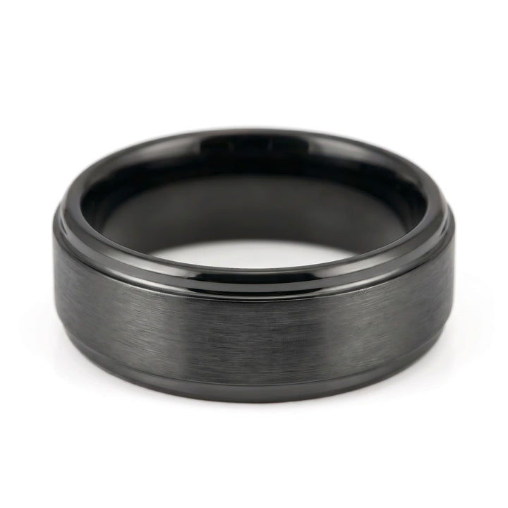 Brushed Tungsten Band (Black) close up at an angle, lying on its side