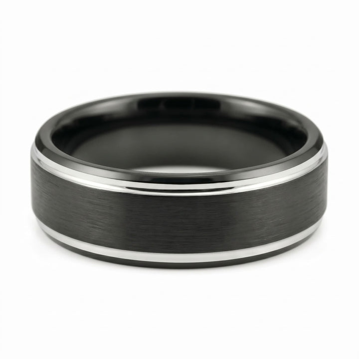 Brushed Tungsten Black & Silver Band close up at an angle, lying on its side