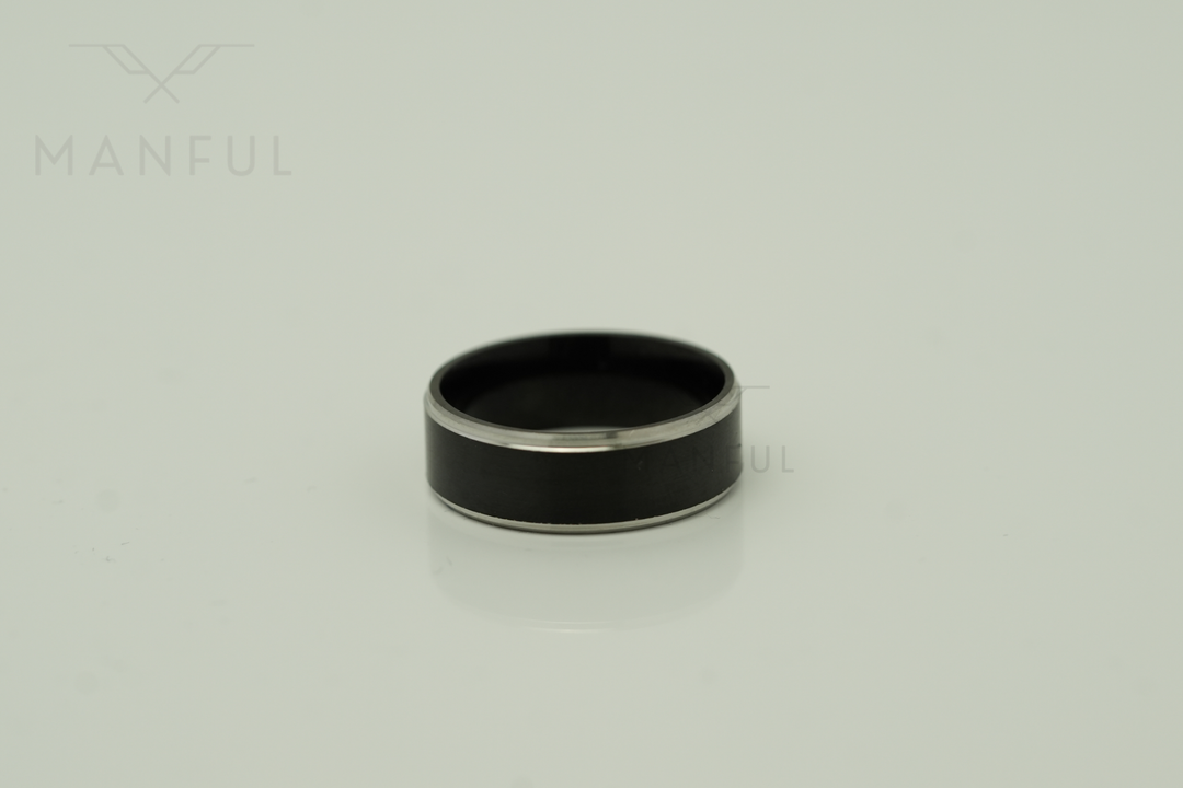 Brushed Tungsten Black & Silver Band, isolated on a plain background in a side-on flat view