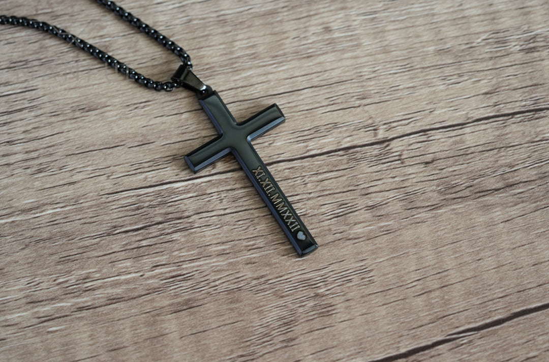 Cross Pendant Necklace Black, close-up of the engraved text on the vertical bar