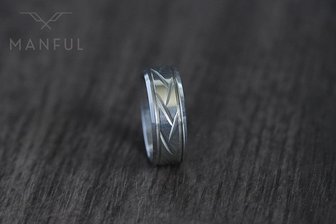 Crosscut Band Silver, standing upright on a dark wood surface with more grain visible in frame