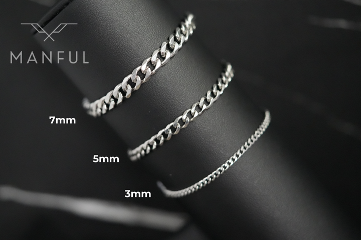 Cuban Chain Bracelet Silver, three widths draped over a black wrist form labelled 3mm to 7mm