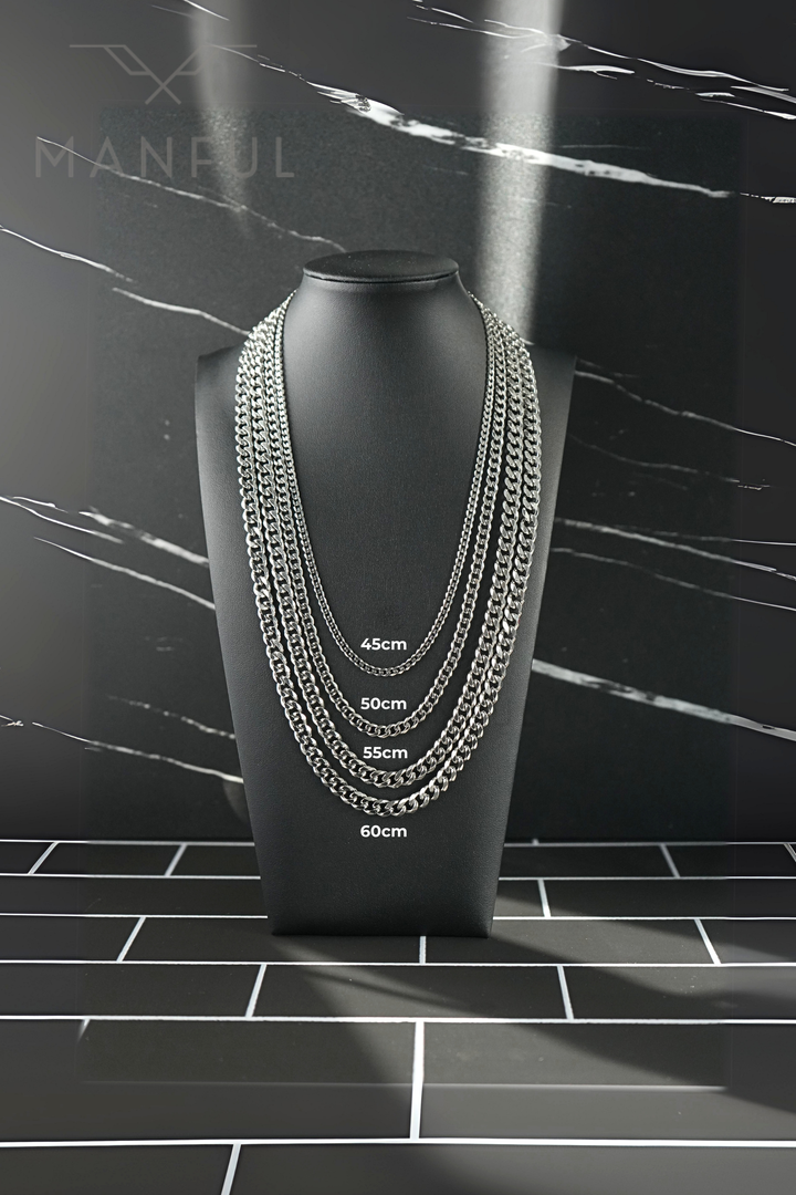 Cuban Chain 7mm Silver, layered on a display bust comparing 45cm to 60cm length options