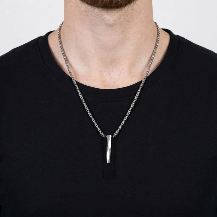 Cuboid Pendant Chain (Silver) on a man's chest over a black t-shirt