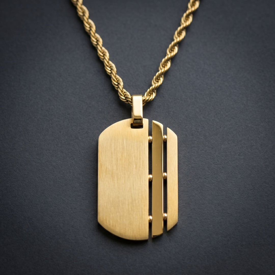 Dog Tag Chain (Gold) against a dark charcoal backdrop