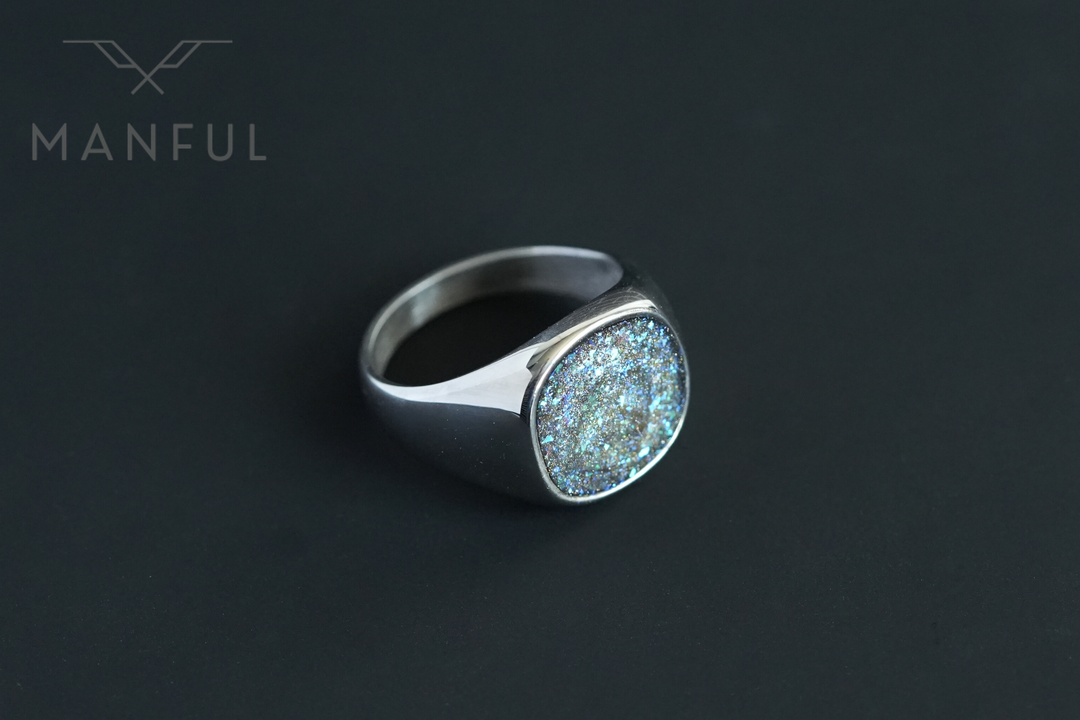 Galaxy Signet Ring, close-up angled view on a plain charcoal background