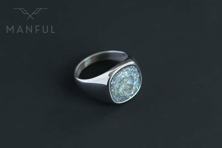 Galaxy Signet Ring, close-up angled view on a plain charcoal background