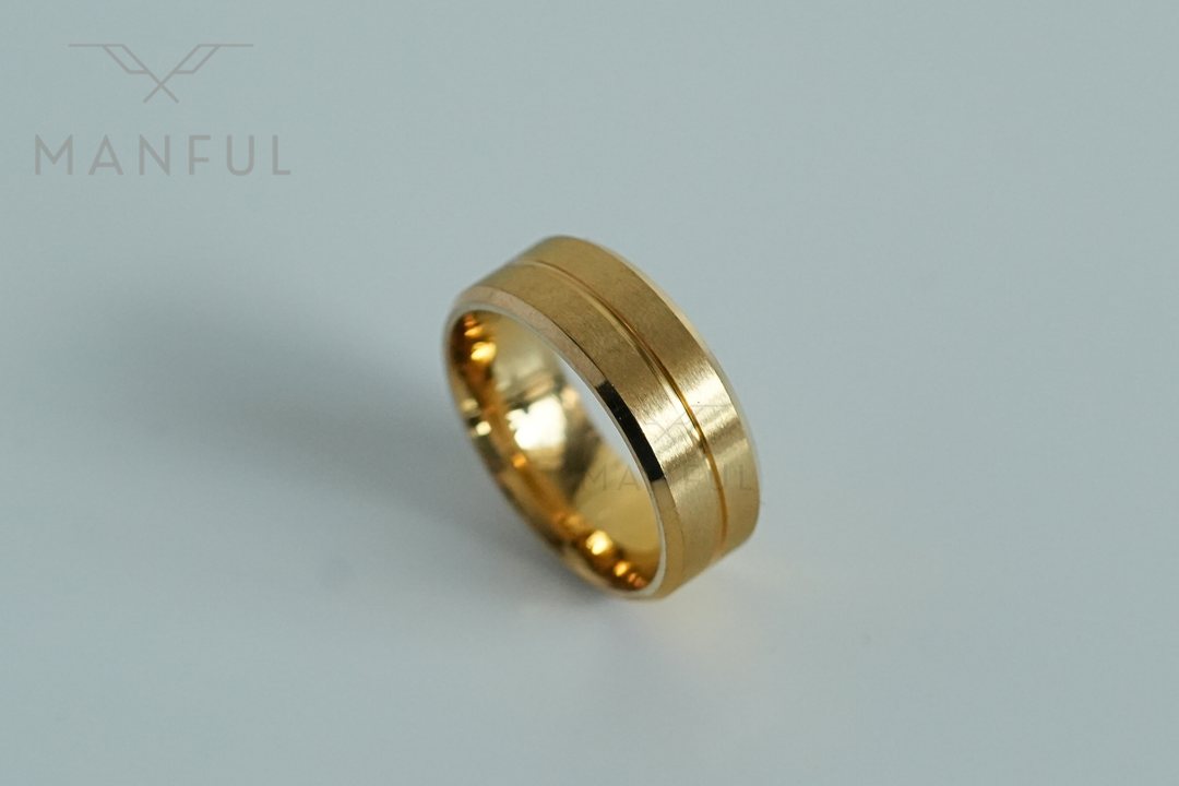 Gold Band, angled close-up on a plain light background