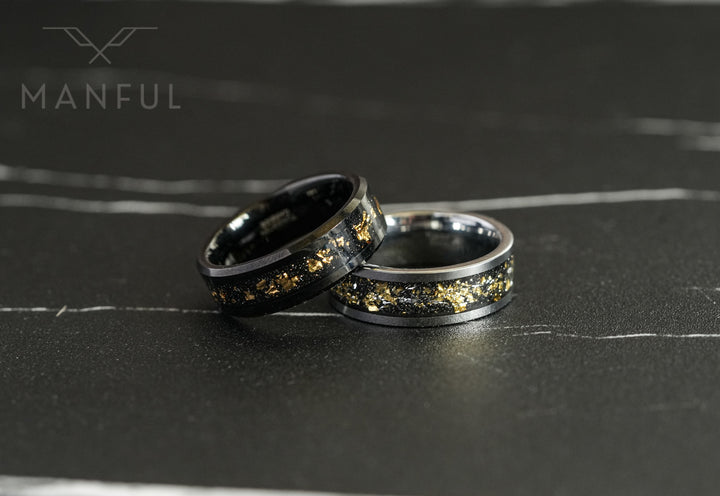 Gold Leaf Inlay Band Silver, paired with a matching black ring on a marble surface