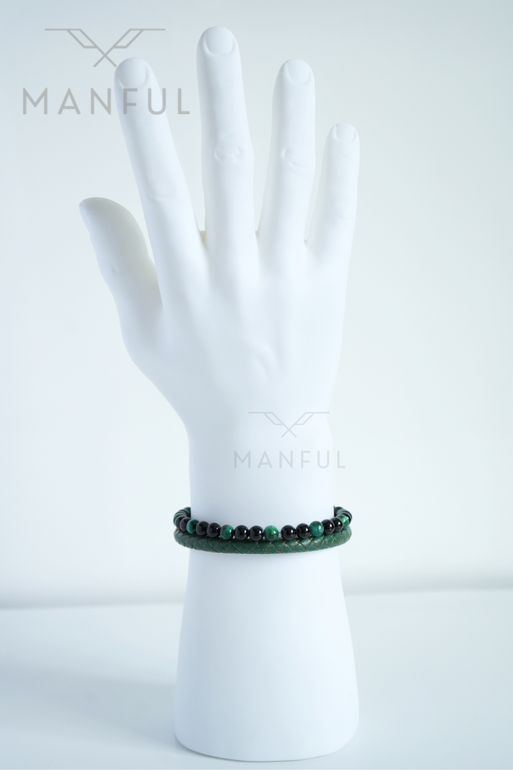 Jade Bead And Leather Bracelet, worn loose on a mannequin wrist with the clasp turned to the side