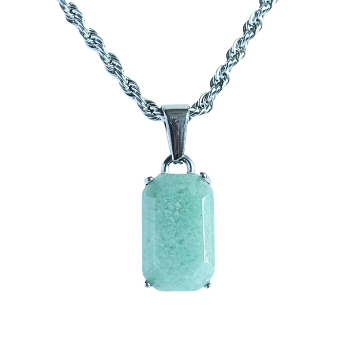 Jade Stone Pendant Silver, isolated on white hanging from a rope chain