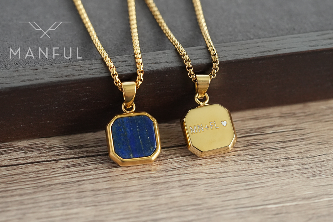Lapis Square Necklace Gold, shown beside a second pendant engraved MN + FL on the back