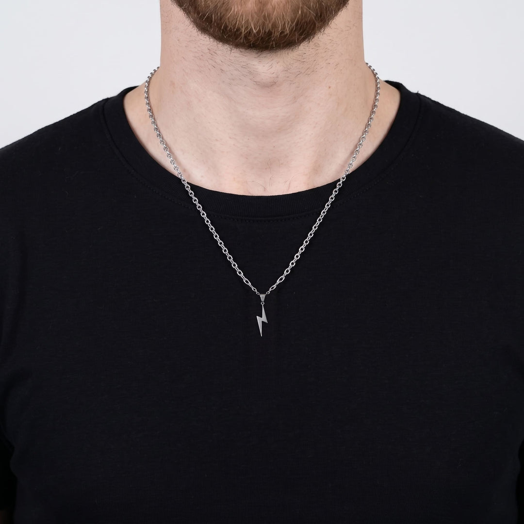 Lightning Pendant Necklace (Silver) on a man's chest over a black t-shirt