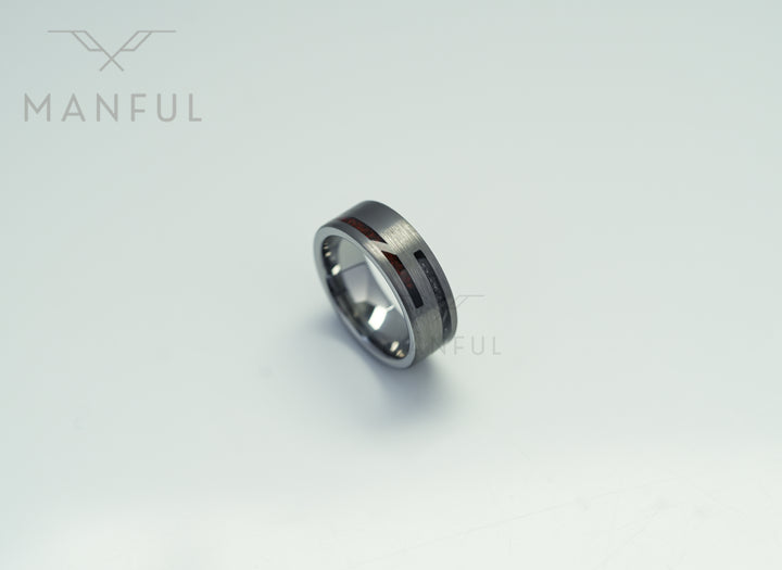Meteorite & Dinosaur Bone Inlay Band, isolated on a white background in a close-up angled view of the inlay
