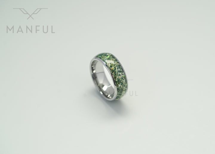 Moss Agate & Crushed Opal Ring, isolated on a white background in a close-up angled view