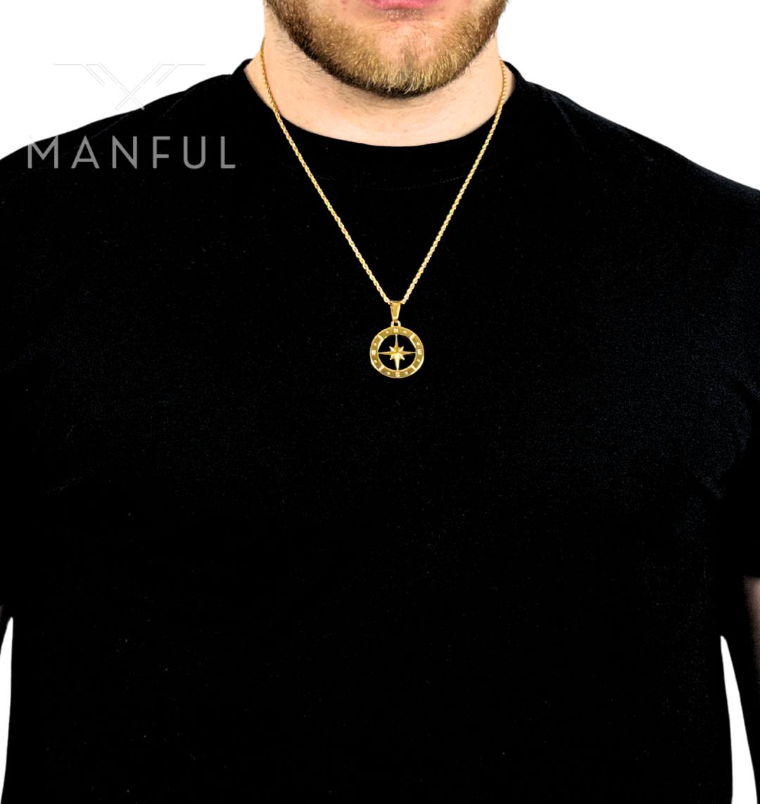 North Star Compass Pendant Necklace Gold, worn against a black t-shirt