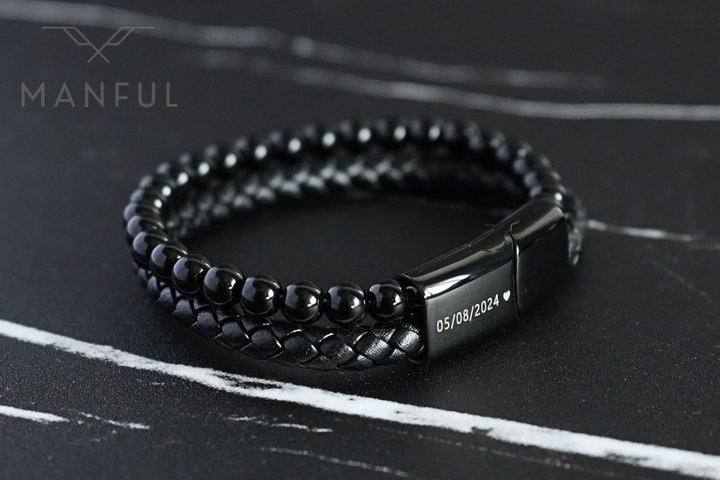 Onyx Bead And Leather Bracelet, close-up of the clasp engraved with a date and a heart icon