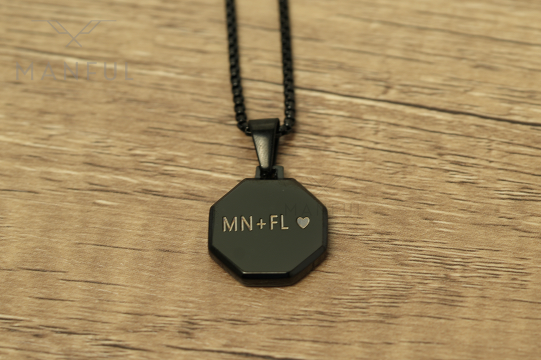 Onyx Octagon Necklace Black, close-up of the pendant engraved with initials and a heart