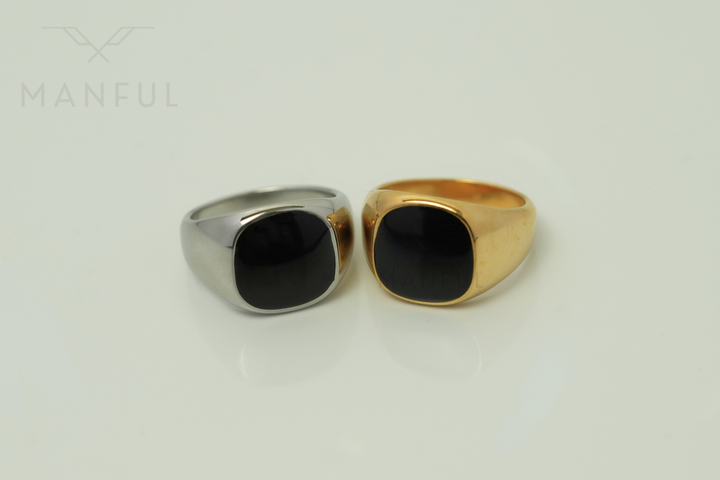 Onyx Signet Ring Silver, paired on a pale background next to the matching gold version