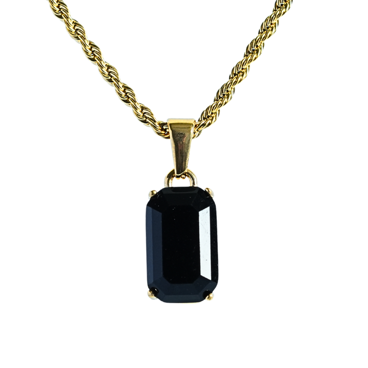 Onyx Stone Pendant Gold, isolated on a white background hanging straight on a rope chain