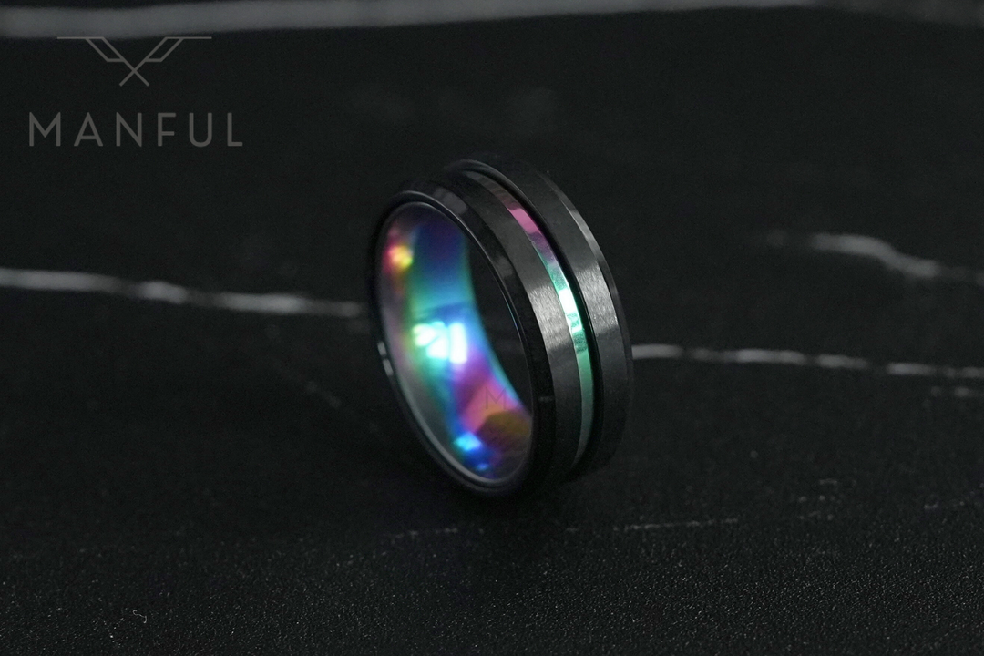 Rainbow Band, pulled back on dark marble with veining arching across the top