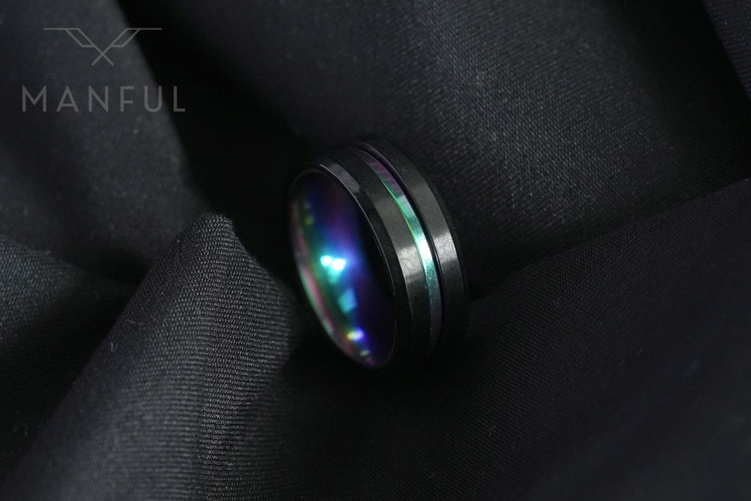 Rainbow Band, nestled in the folds of black fabric