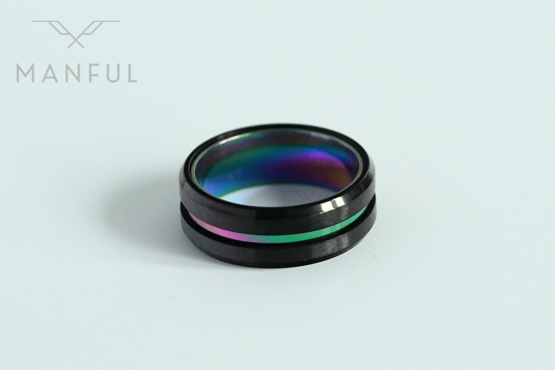 Rainbow Band, lying face on on a plain pale blue-grey background