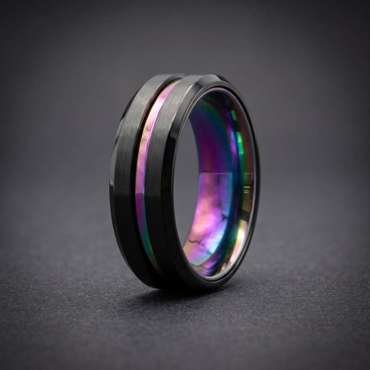 Rainbow Band standing on a dark charcoal surface with the rainbow inside in view