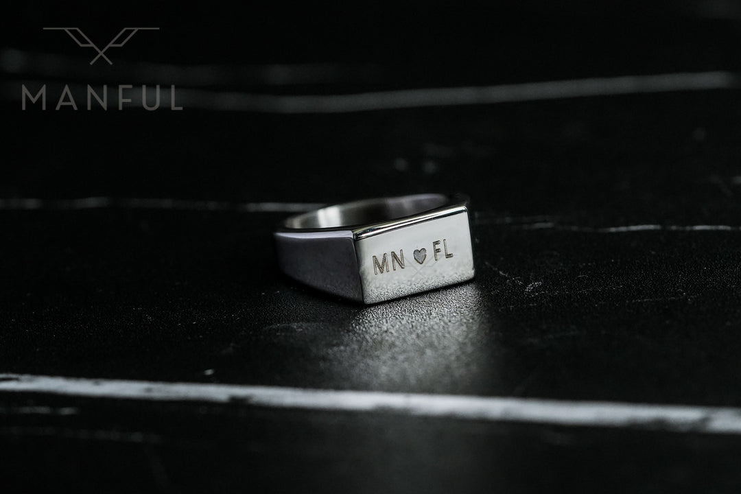 Rectangular Signet Ring Silver, close-up of the engraved MN and FL initials on the face