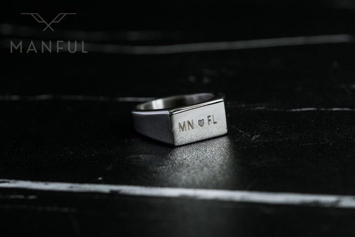 Rectangular Signet Ring Silver, close-up of the engraved MN and FL initials on the face