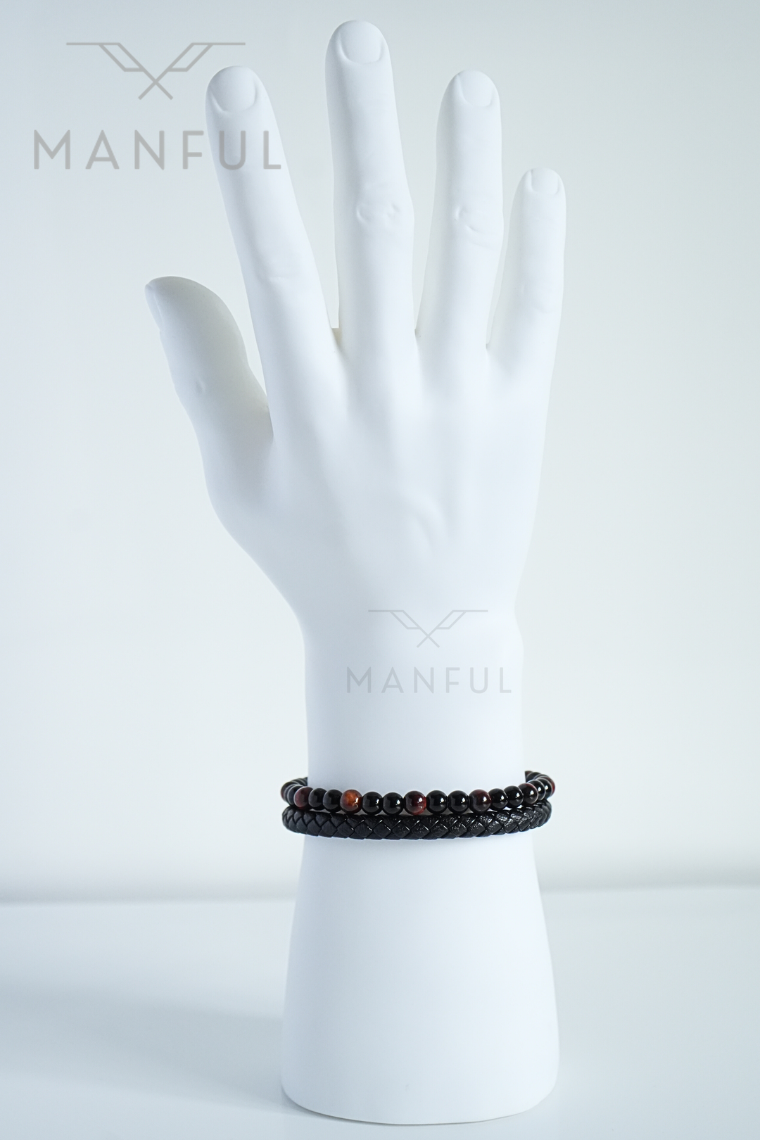 Red Tigers Eye Bead And Leather Bracelet, worn on a white mannequin wrist facing forward