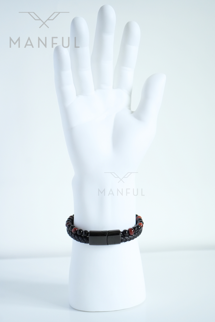 Red Tigers Eye Bead And Leather Bracelet, worn on a white mannequin wrist turned to show the clasp