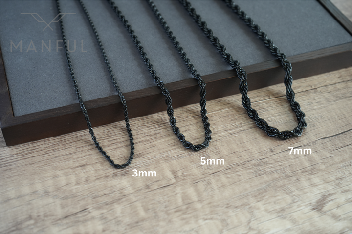 Rope Chain 7mm Black, displayed with 3mm and 5mm width comparisons on wood