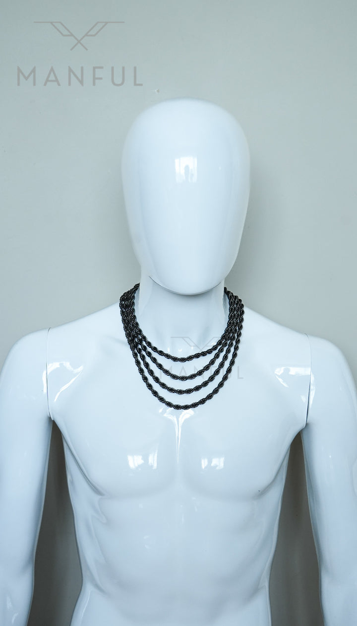 Rope Chain 7mm Black, worn layered with three other rope chains on a mannequin torso