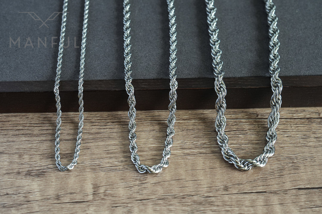 Rope Chain 3mm Silver, three thicknesses laid over a dark wood table