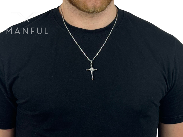 Rose Cross Pendant Necklace Silver, worn around a man's neck over a black t-shirt
