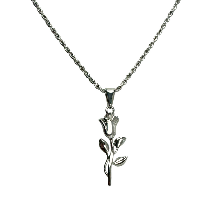 Rose Pendant Necklace Silver, isolated on a white background hanging from its rope chain